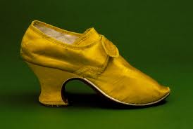 Ladies yellow silk shoe showing the Louis heel. 1760s.